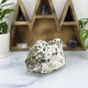 Green Tourmaline Rough Crystal on Matrix on marble base for reference.