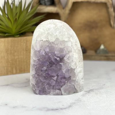 amethyst lamp with decorations in the background