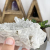 Close up view of points on the Crystal Quartz Cluster on hand for reference.