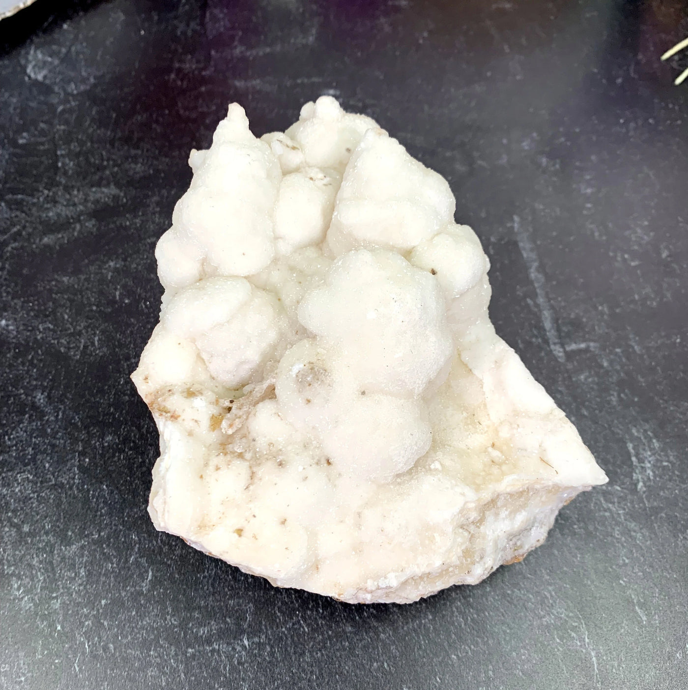 calcite with decorations in the background