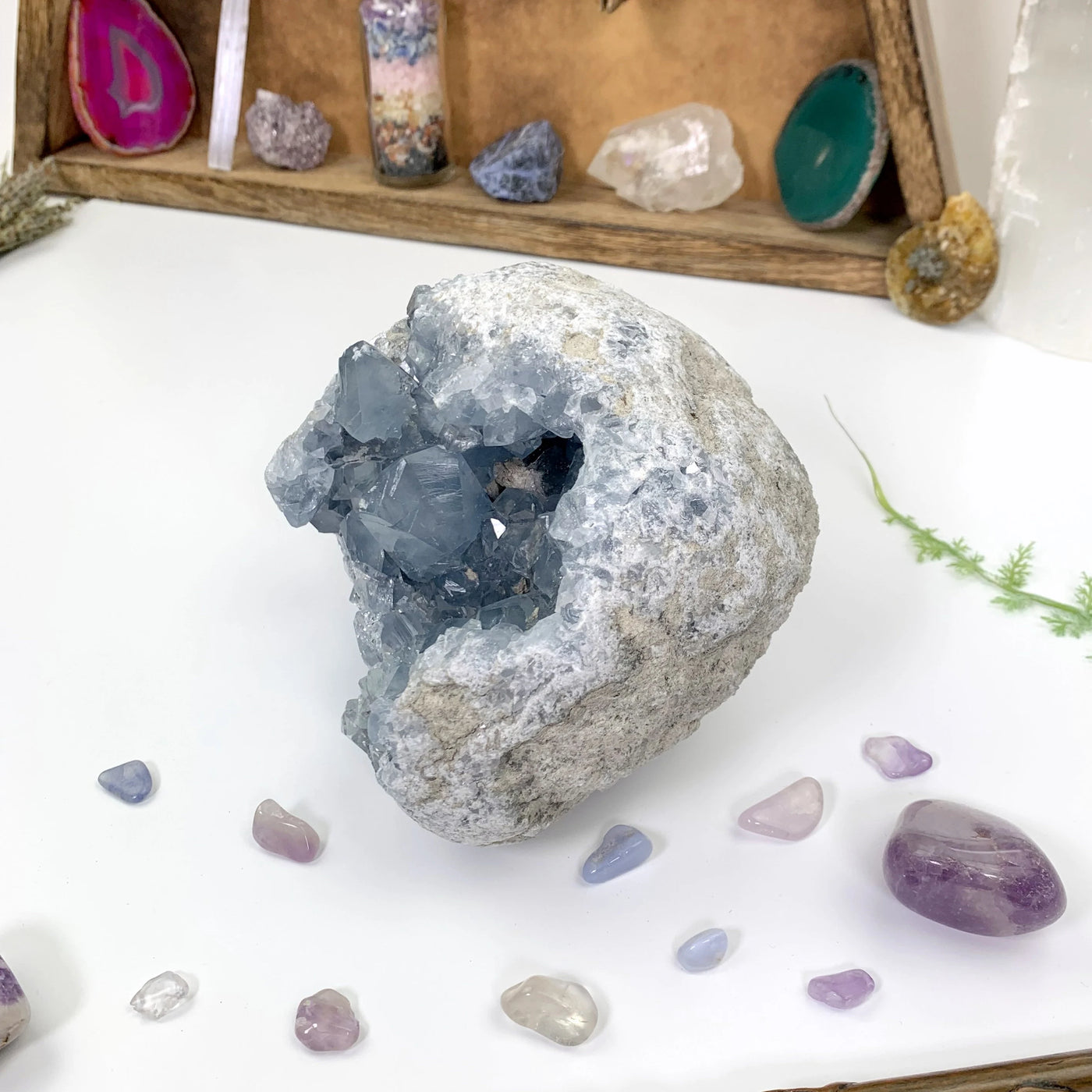 celestite with decorations in the background