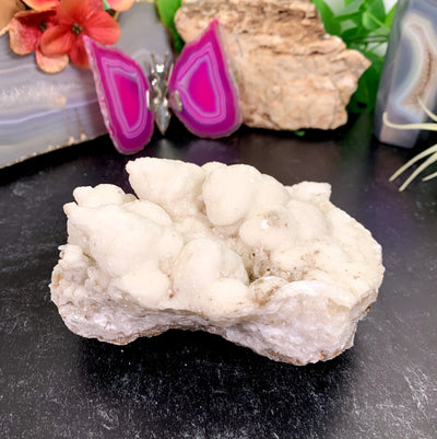 calcite with decorations in the background