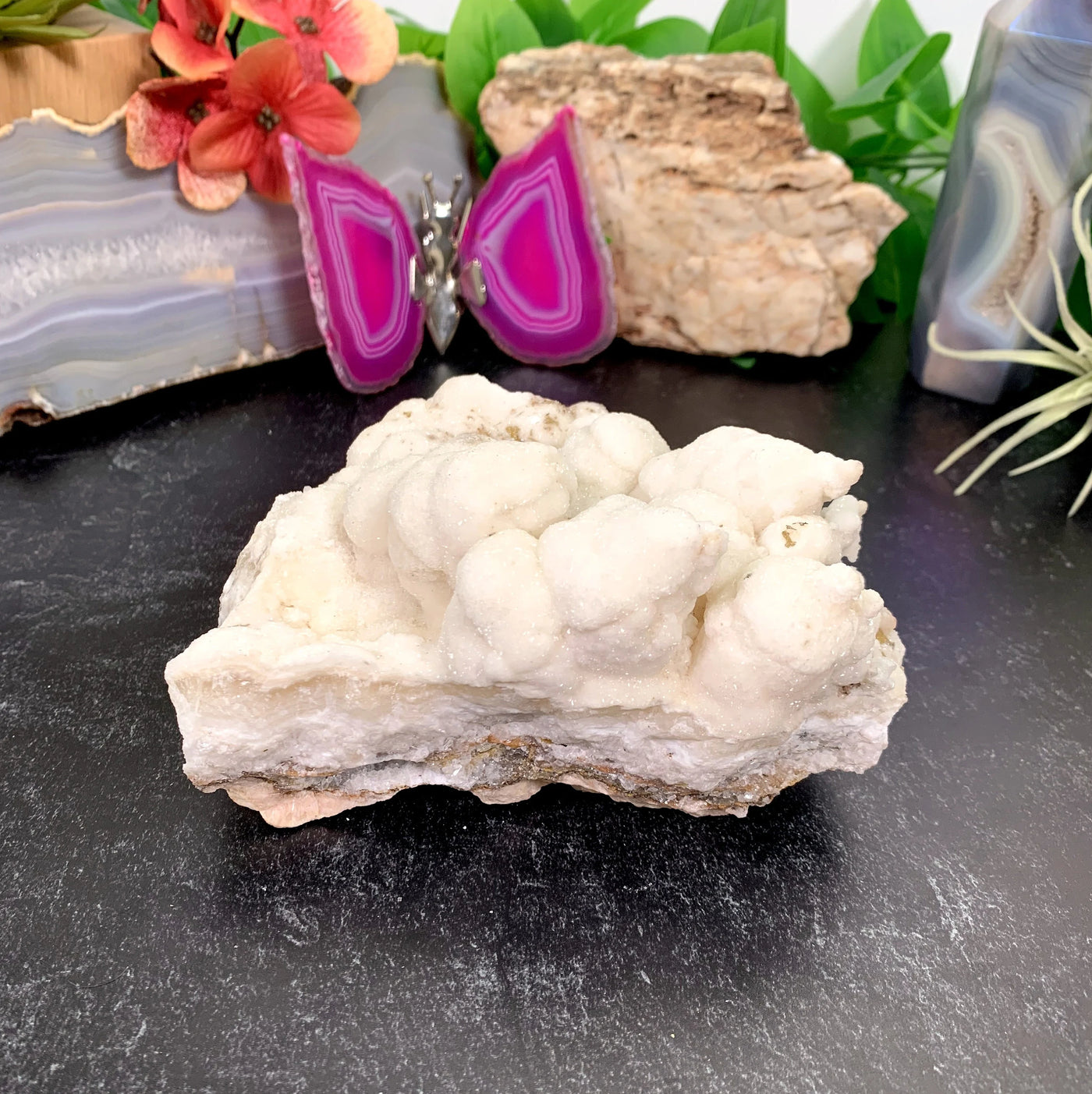 calcite with decorations in the background