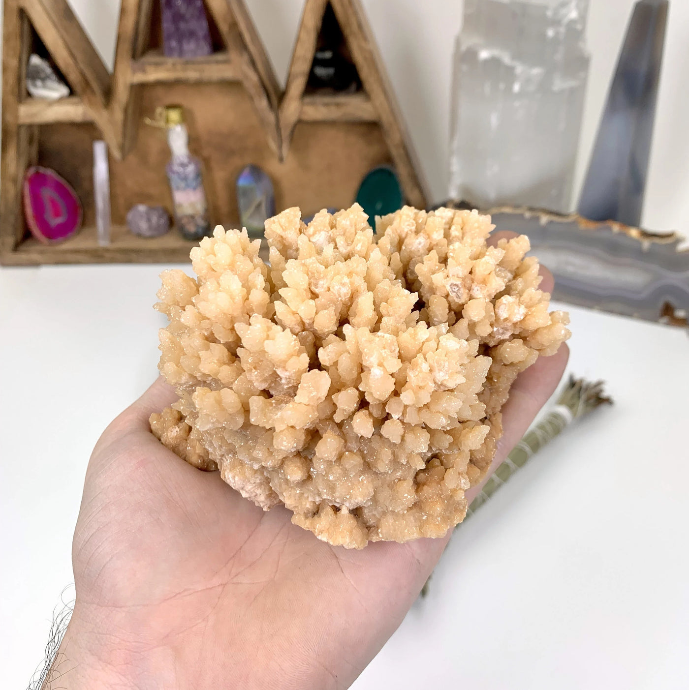 calcite with decorations in the background