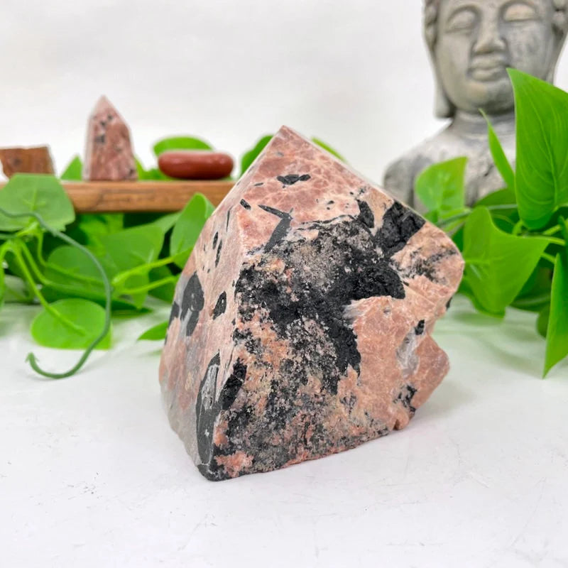 feldspar with decorations in the background