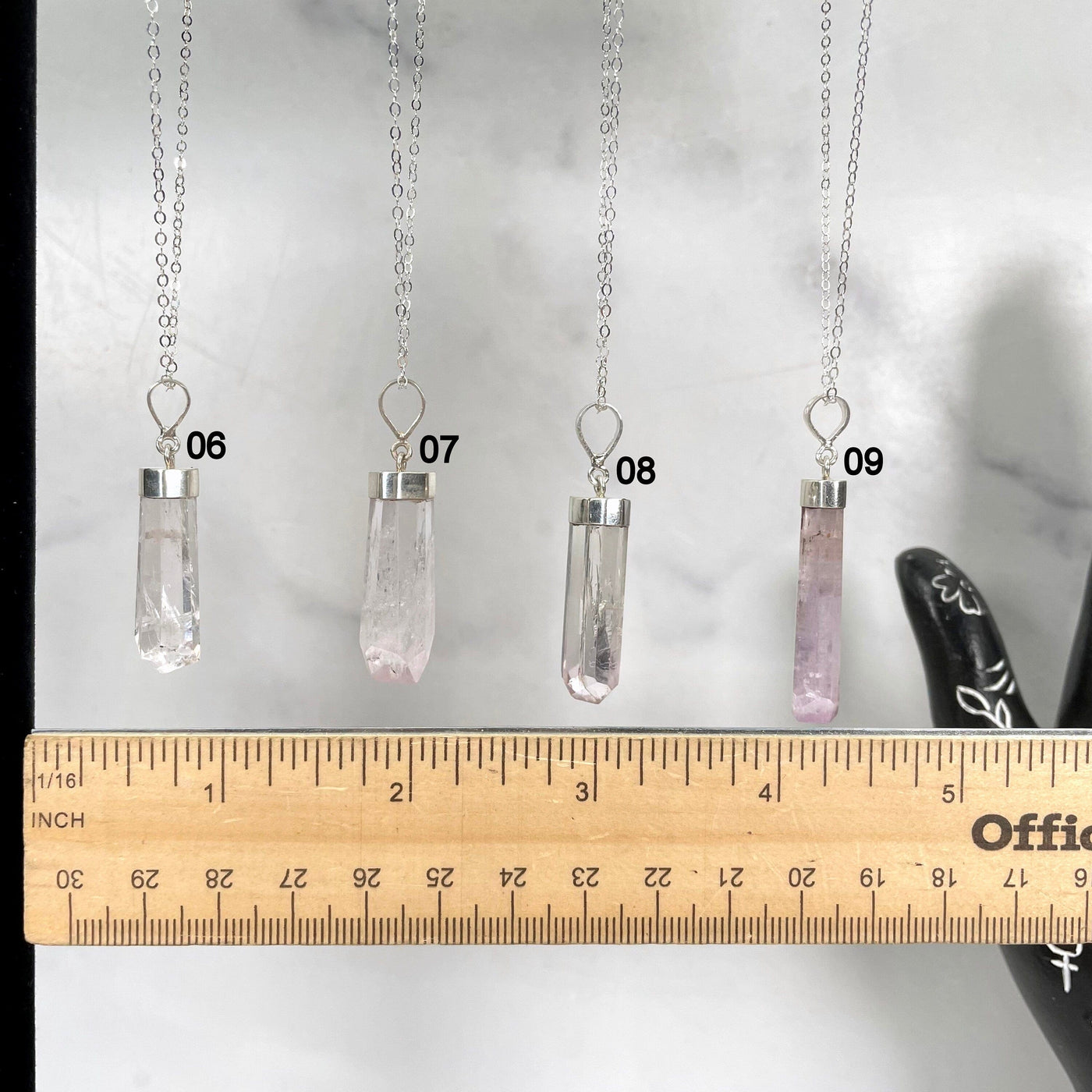 Pink Kunzite Necklace with Sterling Silver Chain showing choices #6-#9 with a ruler for size reference