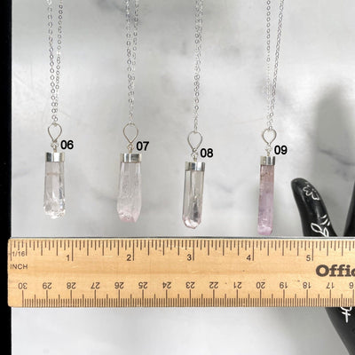 Pink Kunzite Necklace with Sterling Silver Chain showing choices #6-#9 with a ruler for size reference