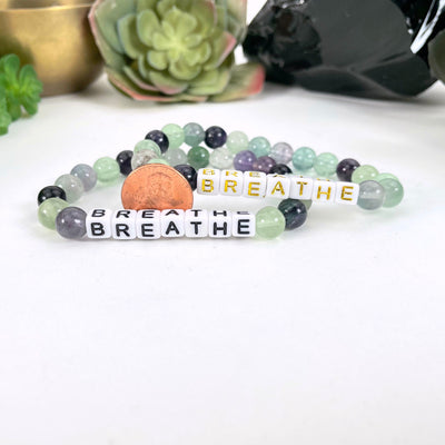 Fluorite Crystal Mala Bead Bracelet - BREATHE  next to a coin for size reference