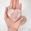 Rose Quartz Crystal Polished Hearts on hand for size reference 