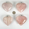 Rose Quartz Crystal Polished Hearts on hand for size reference 