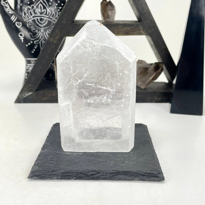 selenite with decorations in the background