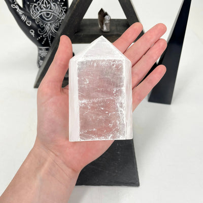 selenite with decorations in the background