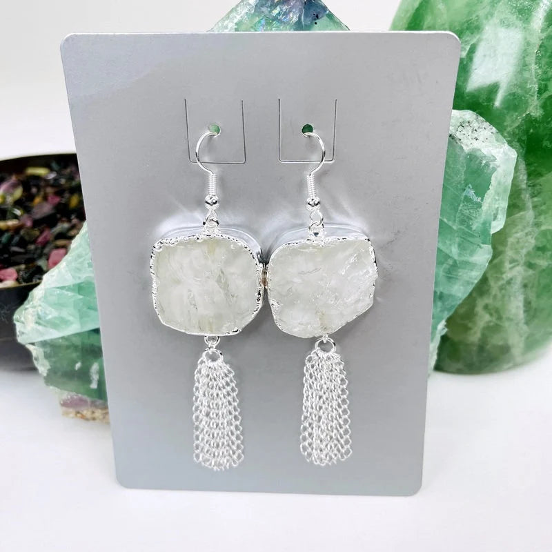 earrings with decorations in the background