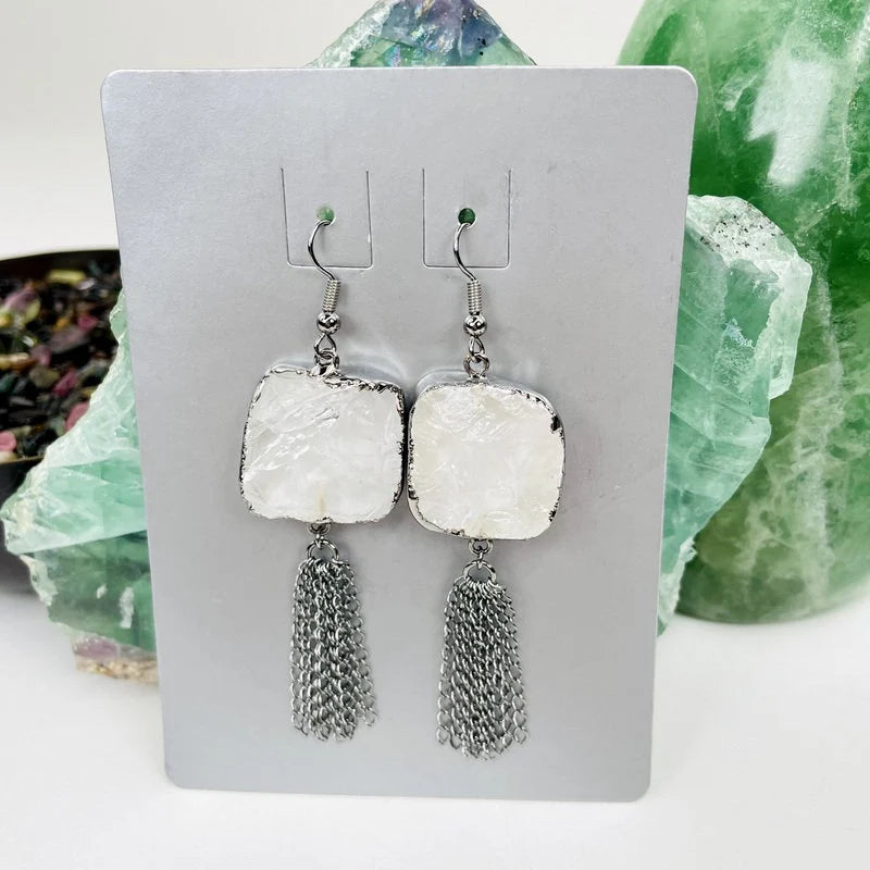 earrings with decorations in the background