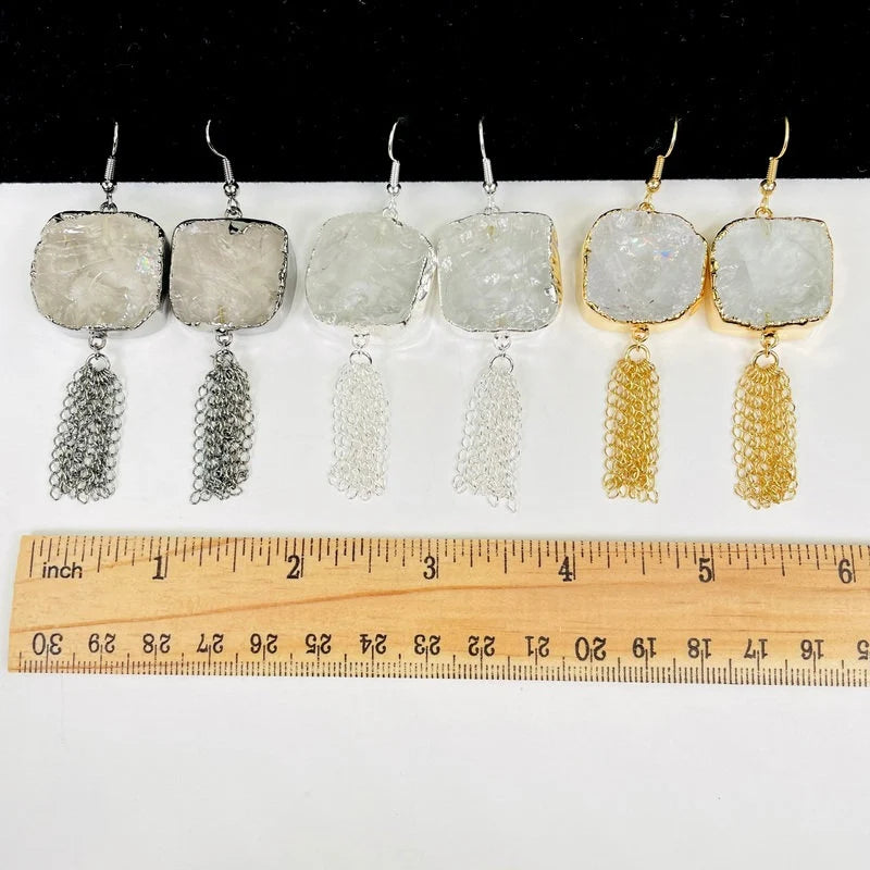 earrings with decorations in the background