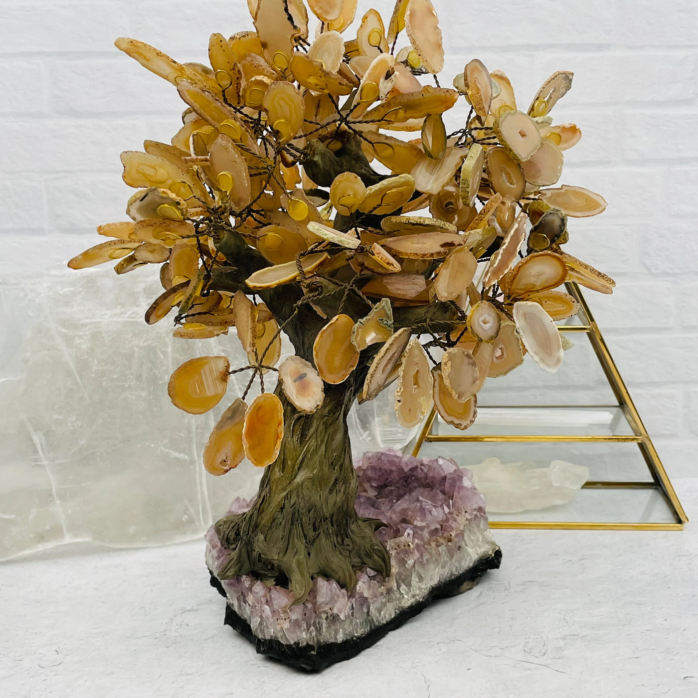 Agate tree with decorations in the background