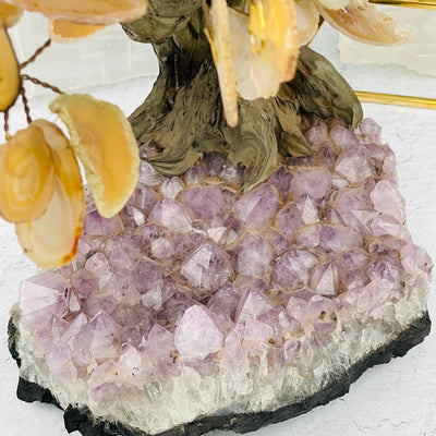 Agate tree with decorations in the background