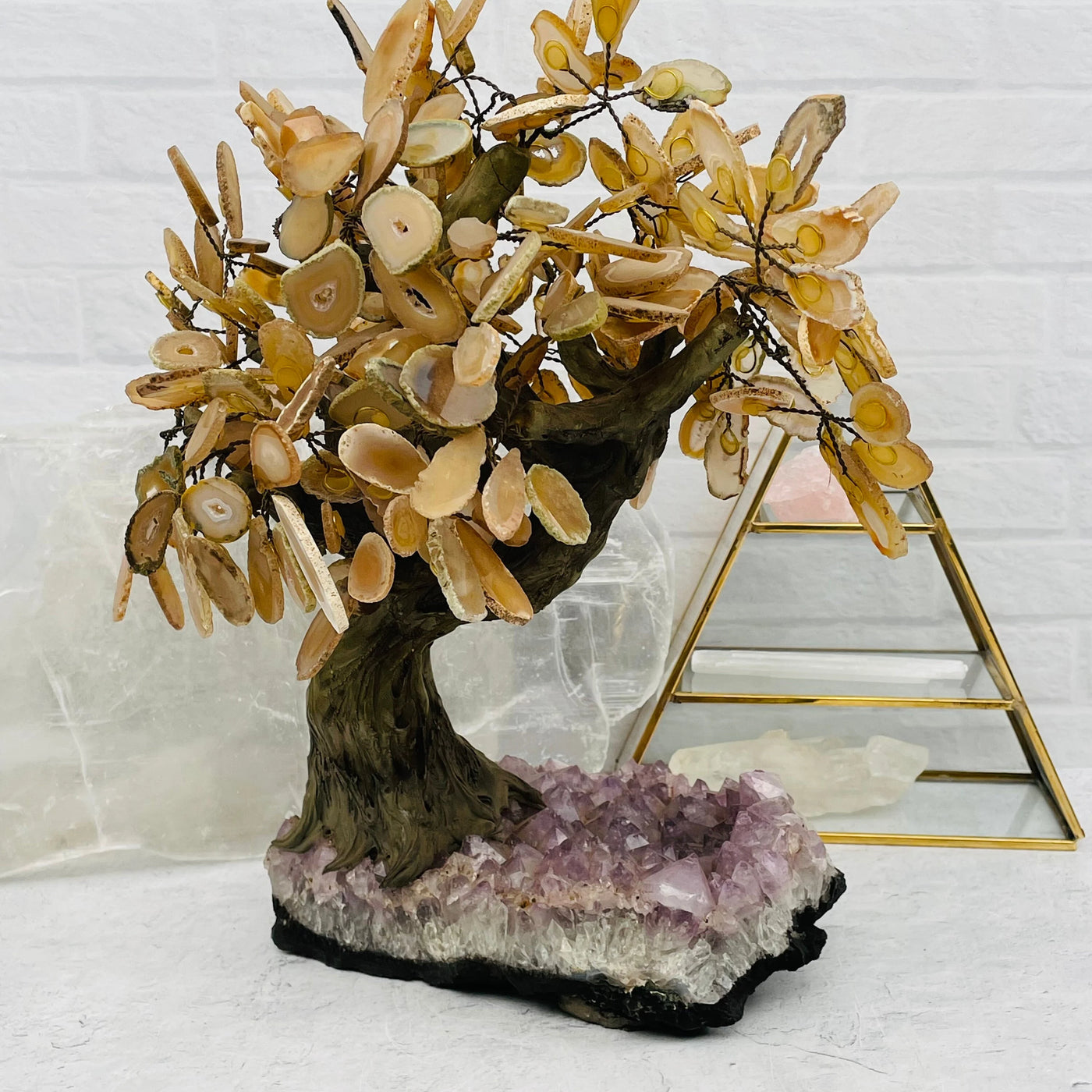 Agate tree with decorations in the background
