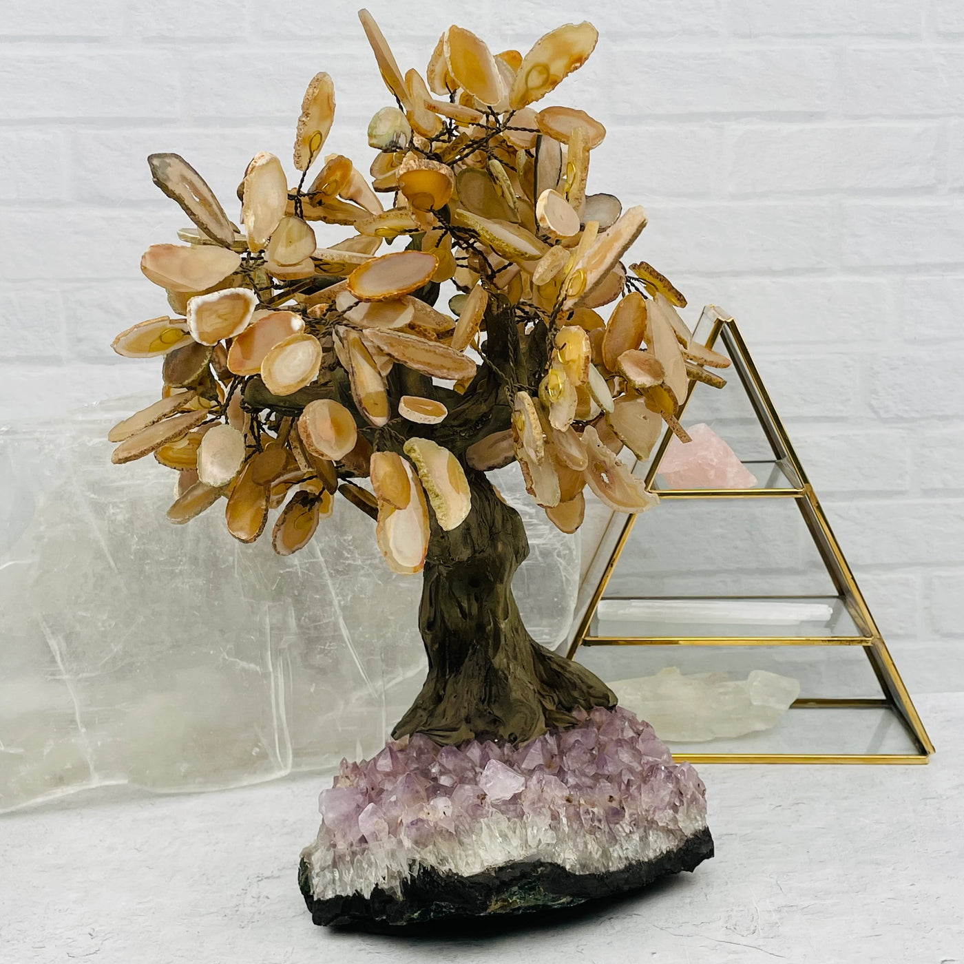 Agate tree with decorations in the background