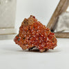 Natural Vanadinite Crystal Cluster with Barite on white base with crystals in background for reference.