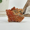 Natural Vanadinite Crystal Cluster with Barite on white base with crystals in background for reference.