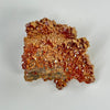 Natural Vanadinite Crystal Cluster with Barite on white background for reference.