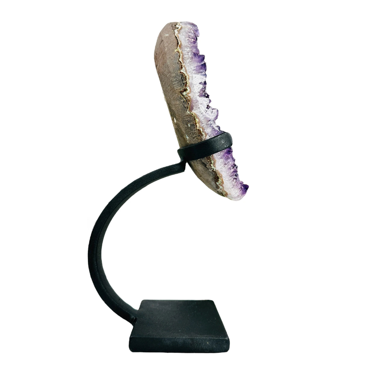 amethyst on stand on white background