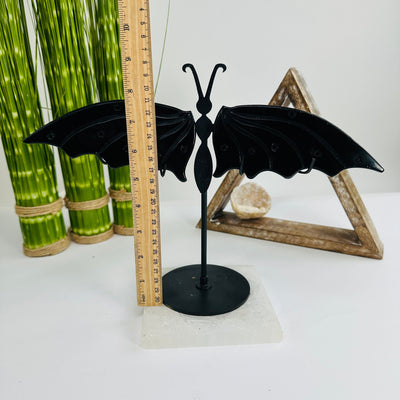 obsidian with decorations in the background