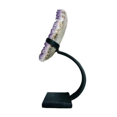 amethyst on stand on white background