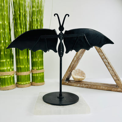 obsidian with decorations in the background