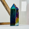Side view of Rainbow Titanium Agate Crystal Point on white base for reference.