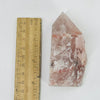 Hematoid Semi Polished Crystal Point AS IS next to ruler for size reference.