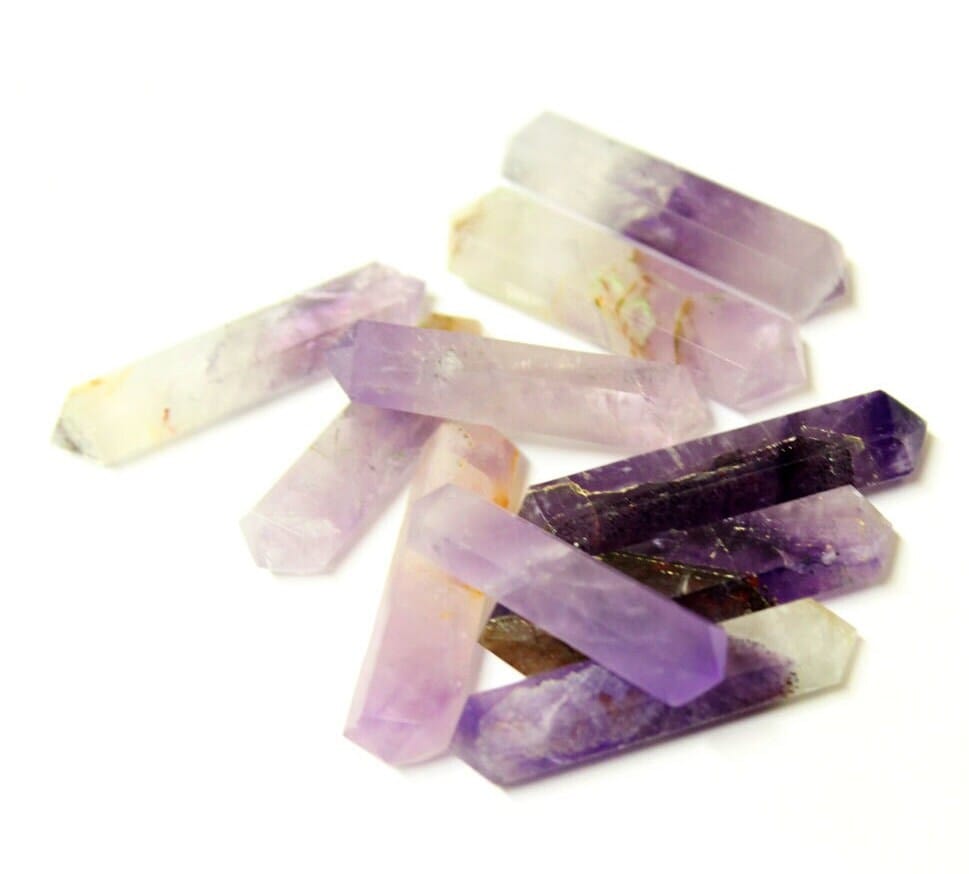 amethyst double terminated points on white background