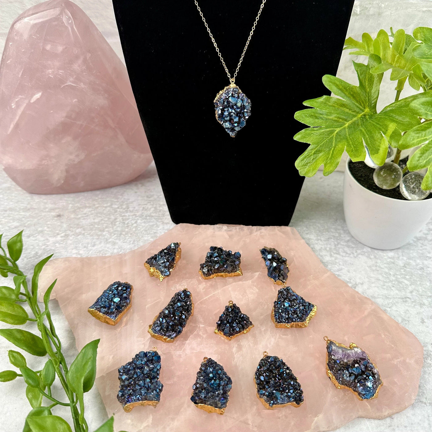 Mystic Blue Titanium Crystal Cluster Gold Plated Pendant - You Choose one pendant on necklace on stand  with other pendants on rose quartz platter