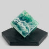 Large Green Crystal Fluorite Cube on black display for display reference.
