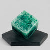Large Green Crystal Fluorite Cube on black display for display reference.