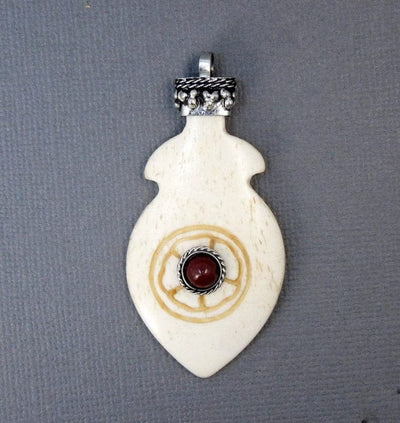 Tibetan Carved Bone Feather Pendant with Red Coral Gemstone and Silver Toned Brass Cap in white