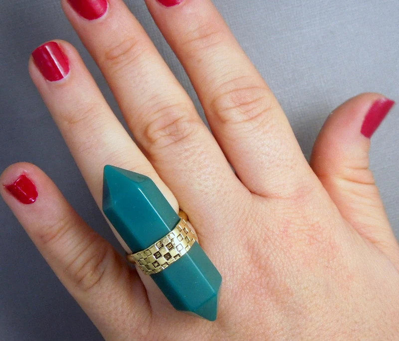 Tibetan ring with decorations in the background