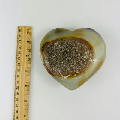 Agate heart next toa ruler for size reference