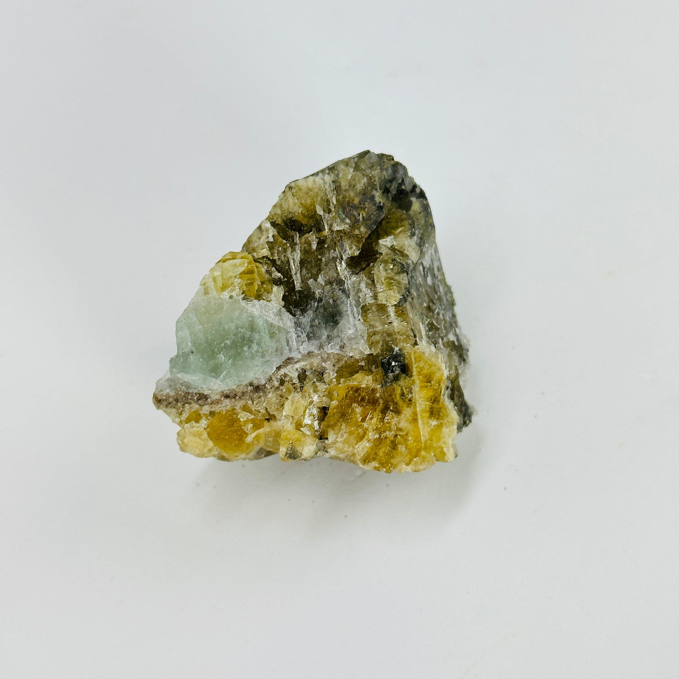 epidote with pyrite growth on white background
