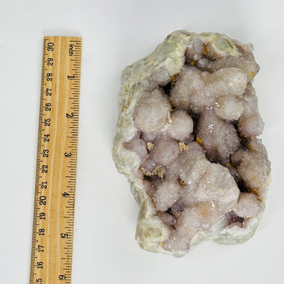 spirit quartz next to a ruler for size reference