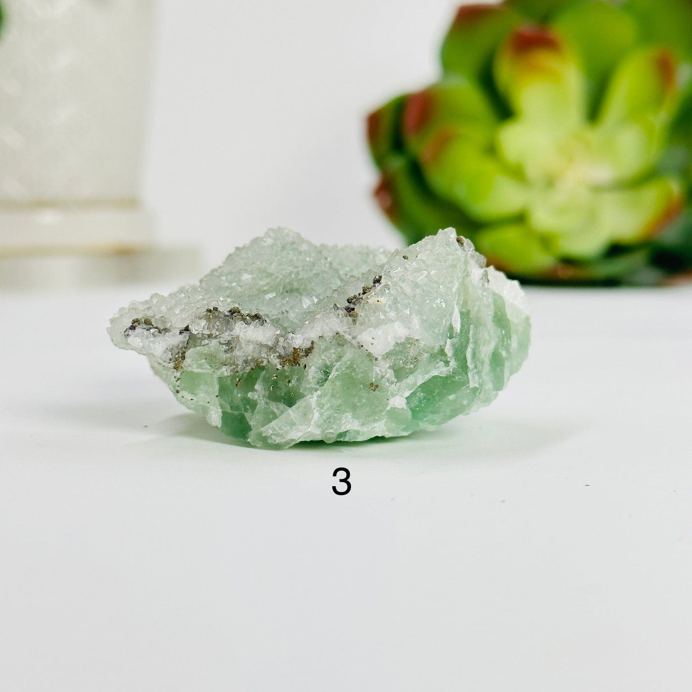 variant 3 of fluorite with pyrite and crystal quartz growth with decorations in the background