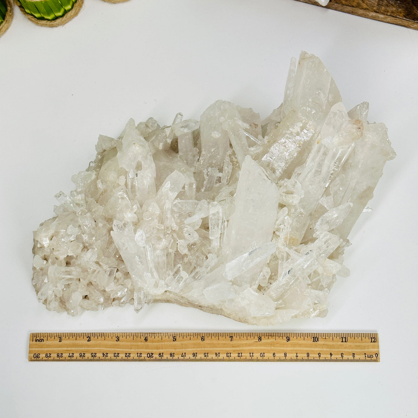 crystal quartz freeform next to a ruler for size reference
