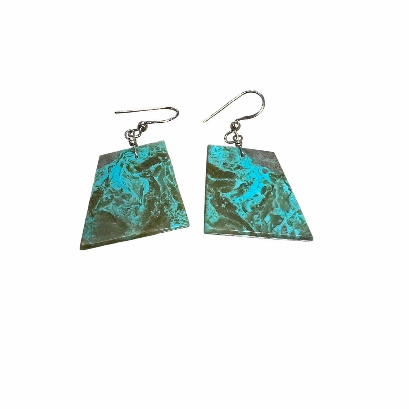 pair of turquoise earrings on white background