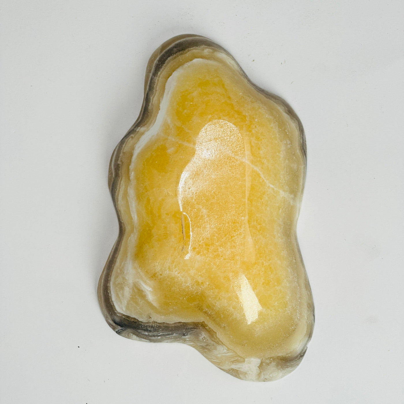 backside of Mexican onyx bowl on white background