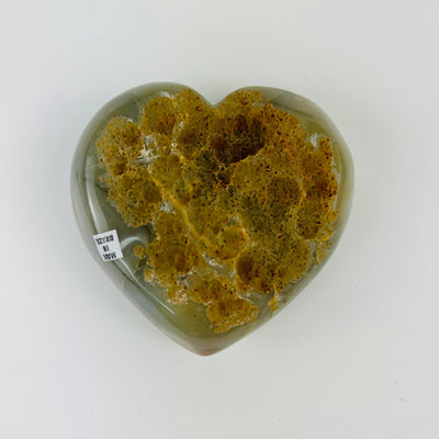 Back view of agate heart on white background
