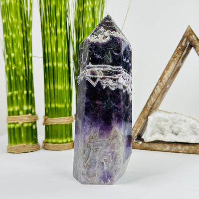 chevron amethyst polished tower with decorations in the background