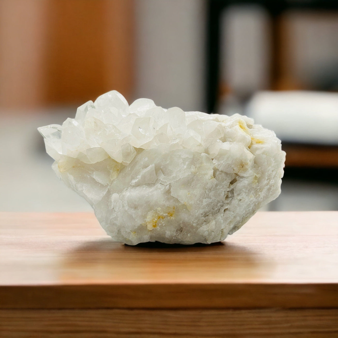 crystal quartz cluster on a table