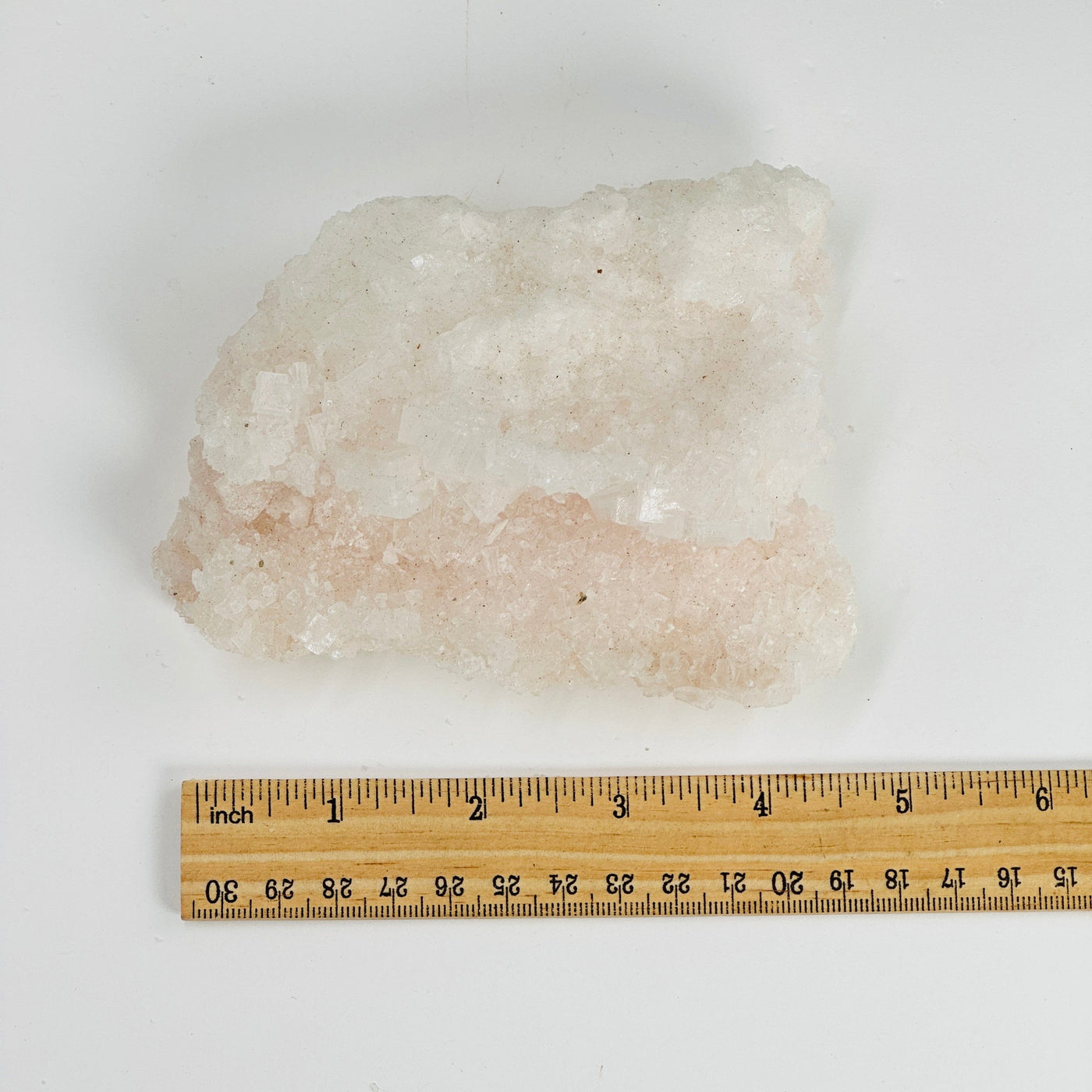 halite freeform next to a ruler for size reference