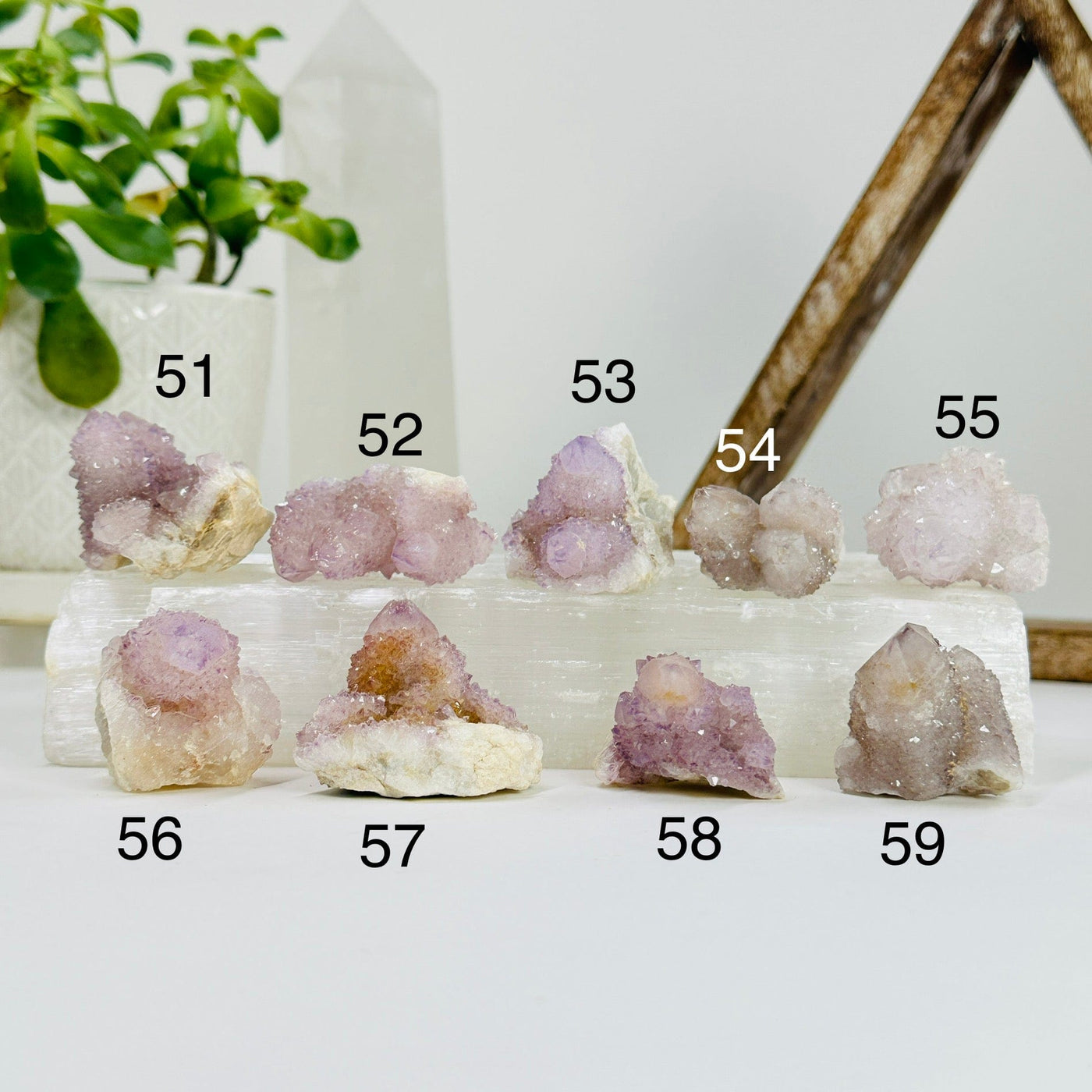 variants 51-59 of spirit quartz with decorations in the background